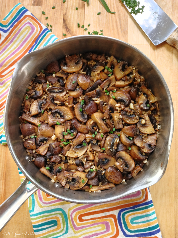 Garlic Butter & Mushroom Rice! Fresh mushrooms sautéed with garlic and butter cooked with rice on the stovetop in a savory, beefy stock for a quick and easy side dish.