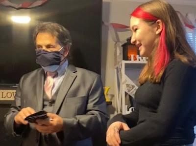 Image of Massachusetts Magician Performing with a mask as the pandemic begins it's initial "ending."with a mask