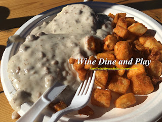 The classic southern breakfast of biscuits and gravy with hashbrowns at Paradise Grille