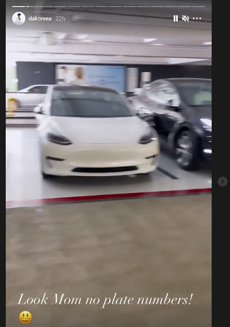 Dakore Akande and family test Tesla car