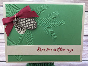 This Chrsitmas card uses Stampin' Up!'s Chrstmas Pines stamp set and Pretty Pines Thinlits Dies (bundled together for a discount!).  It also uses the new Mini Pinecones and the Gold Baker's Twine.  The embossing folder is the new Pine Bough.  #stamptherapist #stampinup  www.stampwithjennifer.blogspot.com