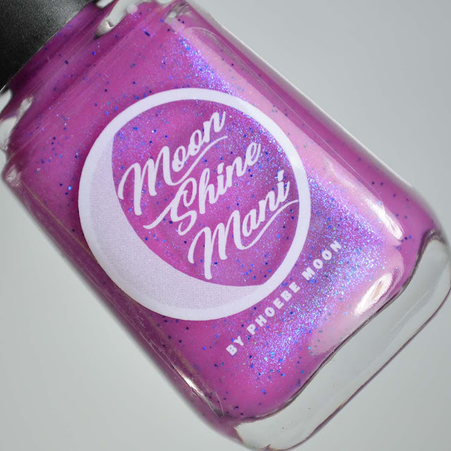 purple nail polish in a bottle