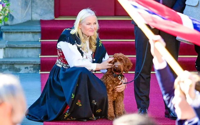 Crown Prince Haakon and Crown Princess Mette-Marit wore their national costumes. Princess Ingrid Alexandra