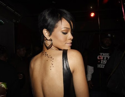 rihanna tattoos and meanings. Pop star and singer Rihanna
