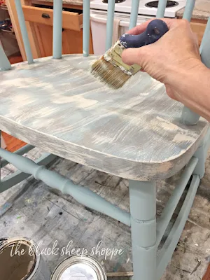 Preparing to blend the paint on the chair.