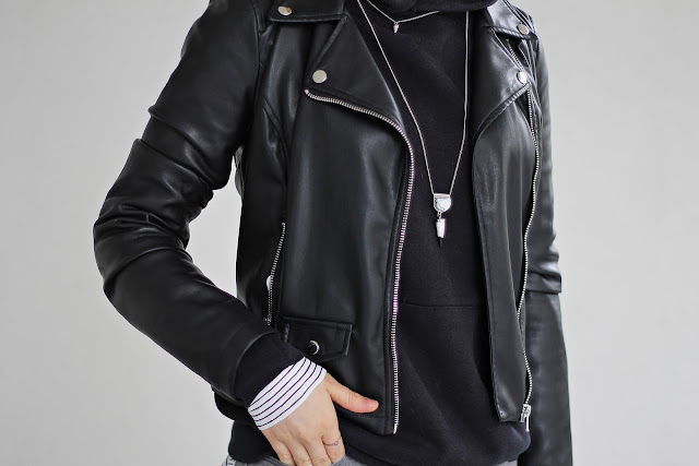 layered necklace and black hoodie