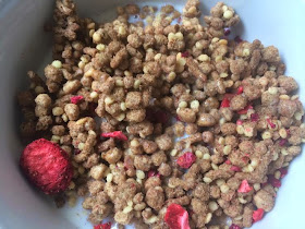 Bowl of All Bran red berry cereal with milk