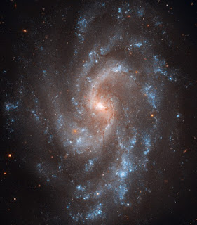 Fotografía de la galaxia espiral NGC 5584, obtenida por el telescopio Hubble