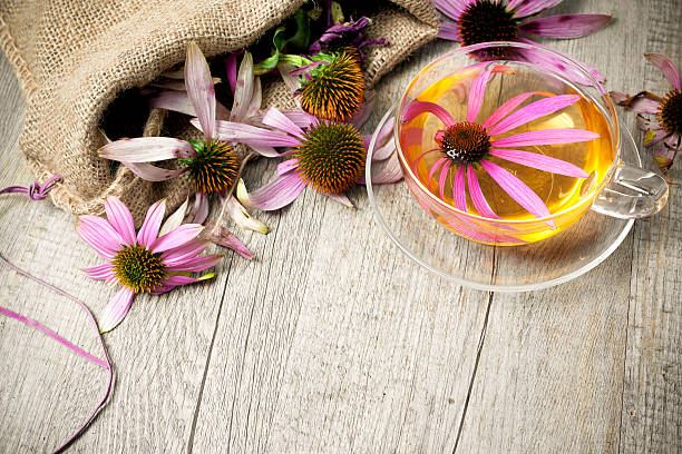 A cup of echinacea tea on a wooden table