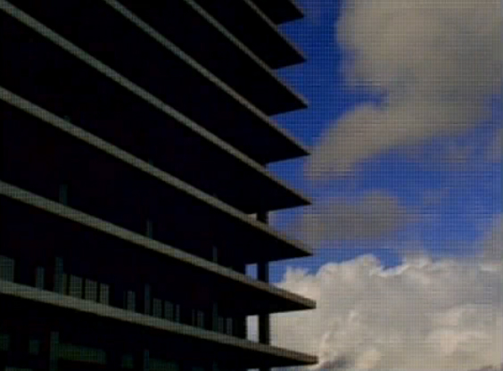 70's Los Angeles office building. 90's tv screen. Sonic Youth Still / screenshot from Little Trouble Girl (1995)