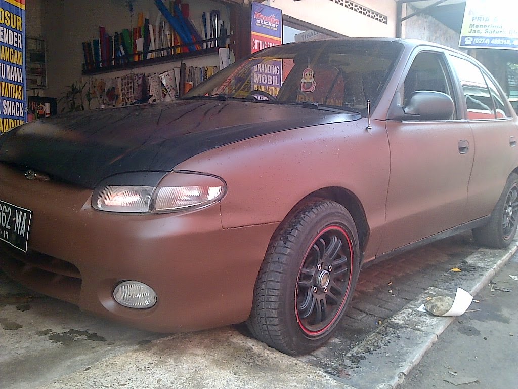 CAR WRAPPING JOGJA STICKER MOBIL SEDAN SOLO PT MAWARDI GROUP