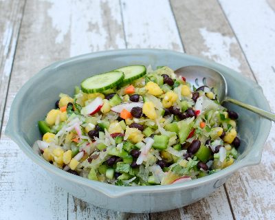 Sauerkraut Salad, another healthy salad ♥ KitchenParade.com, lightened, brightened with vegetables, hominy, black beans. Vegan. Gluten Free. Weight Watchers Friendly.