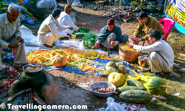 Some time back we had shared about Mandi Dham with detailed information about what it is and why it's it's so special in Himachal Pradesh state of India. This Photo Journey emphasis it's preparation process, which was also touched in THIS Photo Journey. So check out some of these mobile clicks and know more about it.So as mentioned in our earlier Photo Journey, it's completely a different system where most of the members of a particular village or small town come together in morning and handle basic stuff related to food to be cooked for all the guests in a particular celebration. Since trend is changing in towns, that's why I have mentioned villages & small towns specifically. It will be hard to see such things in towns like Shimla, Dharmshala, Hamirpur or any other dense city of the state.Usually this day starts with all villagers come together and help these chefs (Boti) in cutting vegetables and arranging other stuff like spices etc. It's usually a session of 2-3 hrs when everyone keep raw material in place for chefs to do their job in better way. Most of the folks are trained and can take care of this work independently. Many times, some of the vegetables are arranged within the villages, depending upon the season. Pumpkins are used is some of the dishes and mostly fresh out of village-farms. Various other fresh vegetables are used in this preparation.Leaf plates are utilized to serve the food, although plastic plates are also being used these days. Dishes include plain rice, Madra (Sepu badi or Mukand badi, kidney-beans, White grams, Paneer etc), Palda (a curd based dish or curry), jhol (curd rice), mustard based raita or pulses, pulses and sweet rice or Mithdee (made of boondi, Bread crumbs etc). Dishes vary from one region to another as per local culture. Dhule maah (dhuli Urad dal) cooked in desi ghee is a specialty of Mandi Dham while Chambayali Rajmah is the specialty of Chamba dhaam and Kaale chane ka khaata (Sweet and sour sauce) of Kangra dham.Here are some of the senior folks who have done this for many years and now gradually promoted to a level where they have to just motivate others and guide them about right ways of doing things to keep up with the pace of chef. Since work-load is not much with them, it's allowed to get busy in cards :) ...