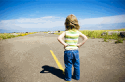 little girl pondering the road ahead