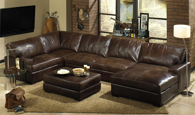 glamorous dark brown distressed leather sofa with small leather table and brown carpet