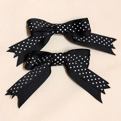 Black polka dot bows