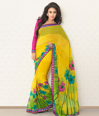 Hrishitaa Bhatt BRAND: Brijraj  CATEGORY: Saree with Unstitched Blouse  COLOUR:  Saree: Yellow and Multi  Blouse: Pink  MATERIAL:  Saree: Poly Georgette  Blouse: Poly Georgette