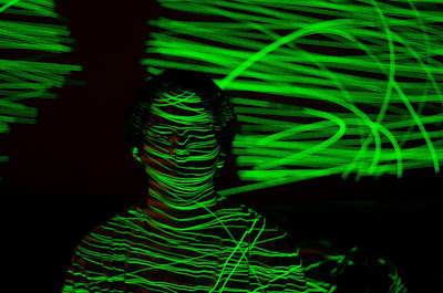 Figure being scanned by lasers - Source: Unsplash - David Anderson - https://unsplash.com/photos/FahhGNl16iM