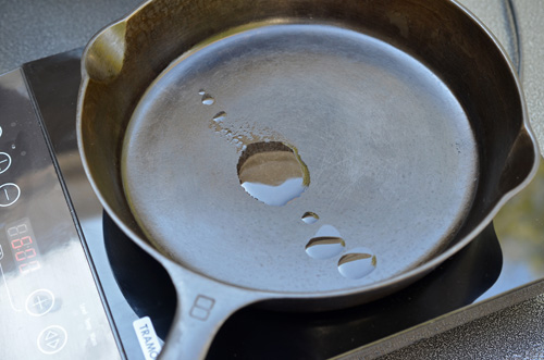 Seasoning a Griswold #8 cast-iron skillet - go sparingly with the oil