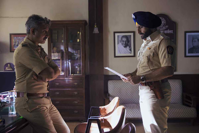 Neeraj Kabi as Officer Parulkar in Sacred Games, Saif Ali Khan as Sartaj Singh, Police Station