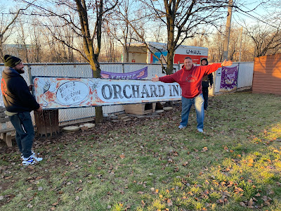 December 2022... Joey Lamberti removing the Orchard Inn sign from his fence and loading onto a truck... which will bring her back to where it all began! How fuckin' cool is that!