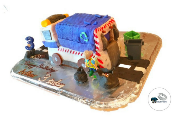  blue bin lorry recycling garbage truck birthday cake on a road