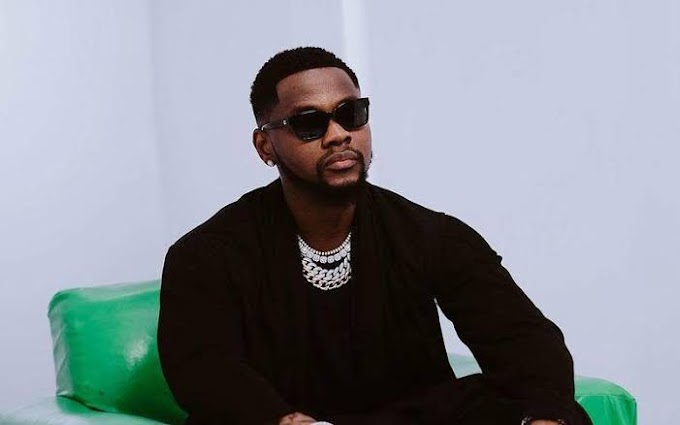 Kizz Daniel Hires Fan He Got Intimate With On Stage (Video)
