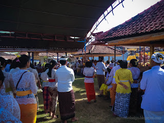 Balinese People Stand Watching Balinese Dance Performance After Worships In Galungan Ceremony