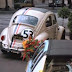 A Herbie movie car, not the hero/glamor car, and maybe not even a driveable one, is on ebay, and they've cranked the reserve up over 50k