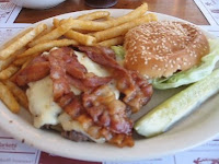 Click to enlarge - Bacon cheeseburger with fries.