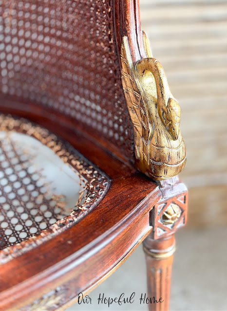 ripped caning chair seat gilded swan arm