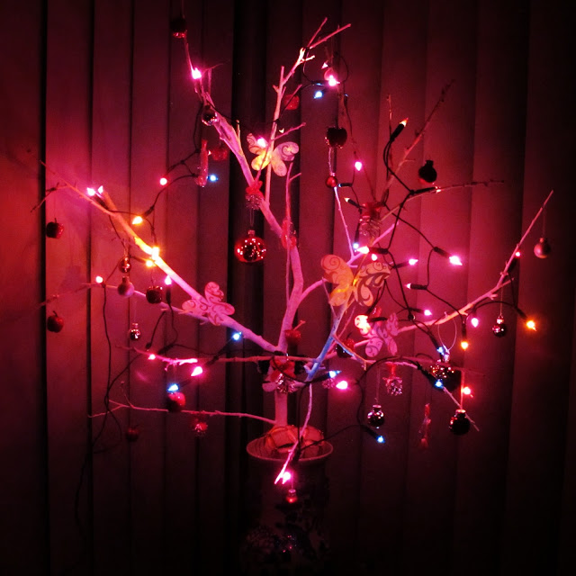 (Lights and Reds} Homemade DIY twig natural christmas tree on petiteplayground.blogspot.com