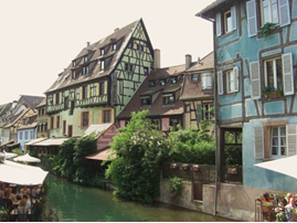 Colmar canal, colourful beamed Alsatian buildings. Photo taken from a bridge