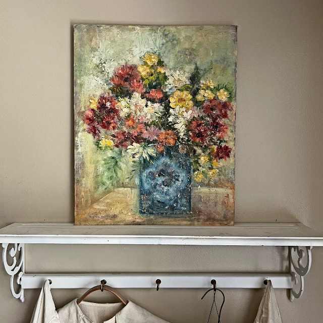 vintage oil painting of a bouquet of flowers in a vase