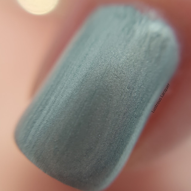 Icy sage green nail polish with a pearl finish from the Pastel City Collection