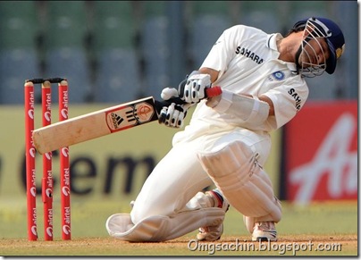 Indian batsman Sachin Tendulkar takes evasive action to avoid a bouncer by West Indian fast bowler Fidel Edwards during the fourth day's play of the third Test cricket match between India and West Indies