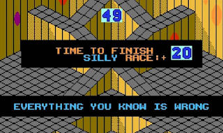 Screenshot of Marble Madness Silly Race level with text "Everything you know is wrong".