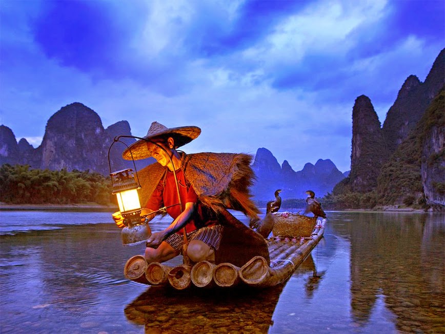 25. Cormorant Fisherman - Li River, Xingping, China - 27 Amazing Travel Photos That Will Infect You With The Travel Bug