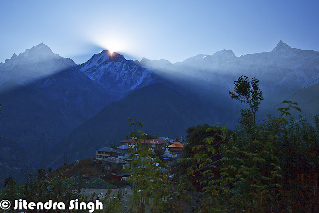 Kinnaur district of Himachal Pradesh is one of the most beautiful places and a great place to explore natural beauty with amazing culture. Jitendra is sharing a Photo Journey from Kinnaur this time. Check out this awesome series of Photographs from different parts of Kinnaur region in Himalayan State of India.Whenever we visualize Kinnaur, the very first thing comes into mind is route beyond Shimla which takes us to Kinnaur region. Kinnaur is connected through roads at very high altitude with deep valleys on one side and rocky mountains on other side. One of the most adventurous road trips in India are planned to Kaza throug various parts of Kinnaur like Kalpa, Rekong Peo, Sangla, Chango, Chitkul, Kothi, leo, lippa, Murang, Naco, Pooh, Rakcham, Ribba etc. Most of the Kinnaru region has beautifuk architecture, where we see amazing wooden houses which lasts for hundreds of year and a very good option for these folks who have to spend most of the year in snow or chilly weather. Kinnaur is one of the districts among 12 districts in Indian state of Himachal Pradesh. Kinnaur district is split into 3 body areas – Pooh, Kalpa, and Nichar. The executive headquarter of Kinnaur district is at ReckongPeo. Kinnaur, enclosed by the Tibet to the east, is within the northeast corner of Himachal Pradesh, regarding 235 kilometer from the capital, Shimla. Sangla Valley is full of orchards of apricots, peaches, chilgozas and apples.Most of the folks in Kinnaur are dependent on the fruit exports. very fine quality of Apple is produced in Kinnaur region of the country.Most of Kinnaur enjoys cold weather due to its high elevation, with long winters from October to May and short summers from June to September. The lower parts of the Sutlej Valley and the Baspa Valley receive monsoon rains. The upper areas of the valleys fall mainly in the rain-shadow area. These areas are considered to be arid regions, similar to the climate of Tibet. Jitendra has spend good time in villages of Kinnaur to understand real culture of the region and how these people live their life. And in states like Himachal, villages are best way to know about a particular geography. This holds good for India as well. India remain unexplored unless you visit villages in different regions like Himachal, Rajasthan, Maharashtra, kerala, North East etc.Zanskar which is a range of mountains and Dhauldhar is another one which enclose valleys of Sutlej, Spiti, Baspa and their tributaries. Kinnaur has beautiful landscape with apple orchards, forests, high hills with snow covered peaks and colorful houses. Spiritual Shivling lies at the height of Kinnar-Kailash Mountain. Hindustan-Tibet Road passes through the Kinnaur region on the bank of stream Sutlej and eventually enters Tibet at Shipki La passThese colorful landscapes with beautiful valleys and high mountains make Kinnaur a best place to spend summers. Climate is quite welcoming in summer, although seeing this place under white sheet of now during winters is altogether a different experience. Connectivity becomes of the issue during winters but it's worth planning fo it.Best way to explore Kinnaur is through own vehicle or hired vehicle, which gives you freedom of stopping anywhere anytime. but in that case, one needs to have control on stoppages as there are many beautiful landscapes on the way which my compell you to stop again n again and you may get late for better landscapes beyond the connectiing road. Road from Shimla to Kinnaur is quite adventurous. Usually tourists come to Shimla via Volvo or Train and then hire a local cab for further explorations.The present day Kinnauras do not constitute a homogeneous group and display significant territorial and ethnic diversity. For a better understanding of ethnic and cultural distribution, Kinnaur district may be classified into three territorial units. Lower Kinnaur comprise area between Chora at the boundary of the Kinnaur district with Rampur Bushahr and Kalpa including Nichar and Sangla valleys. The people of Lower Kinnaur are primarily of the Mediterranean physical type. It is difficult to distinguish them from the people residing in the adjoining Shimla district with whom they have some affinity. The people of lower Kinnaur are mostly Hindus though the ethno-historical factors have resulted in some Buddhist influence.The middle Kinnaur is the area between Kalpa and Kanam including Moorang tehsil. The people of middle Kinnaur are of mixed racial strain. Some have marked Mongoloid and others marked Mediterranean features. Many people have faith in both the religions.The upper Kinnaur comprises remaining north-eastern part of the district i.e. the area between Poo and Hangrang valley extending up to international border with Tibet. The predominant physical type of upper Kinnaur in the Mongoloid though a few persons with Mediterranean features are also seen in the area around Poo. However the people of Hangrang valley are almost universally Mongoloids. They mostly follow Mahayana Buddhist religionKinnaur has some very important rivers - the Satluj, which divides Kinnaur almost in two equal parts. The Spiti is the second major river of the district. Ropa divides the district Kinnaur and Lahaul-Spiti and merges with Satluj near Shiasu. The Baspa river rises on the North-Eastern declivity of the Dhauladhar range. The Yolong also joins the Spiti river.