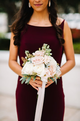 maroon bridesmaid dresses and ribbon bouquet