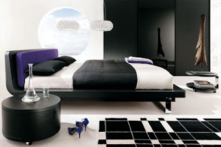 white and black bed and white walls