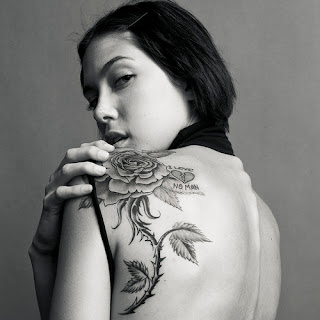 Tattooed Girl with Rose Flower Tattoo Design on Back
