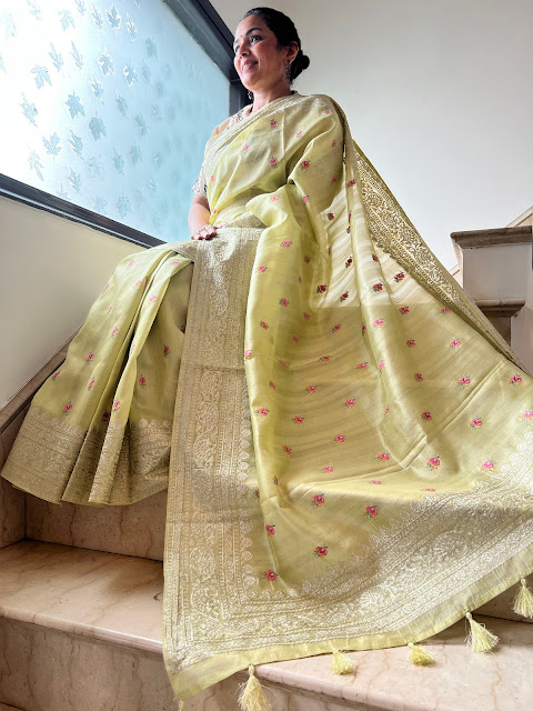 Whispers of Elegance: The Enchanting Lime Green Embroidered Saree with Pink Butis and Silver Threadwork