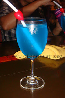 Blue Lagoon mocktails cocktails wine scotch drinks bar at Flame & Grill restaurant South City