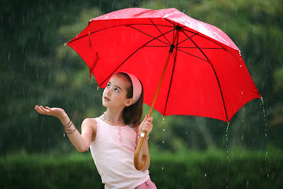 young pretty girl umbrella rain shrinking 