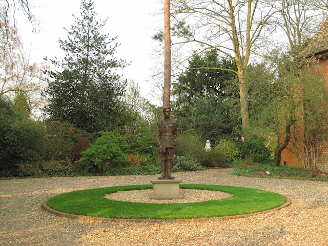 The statue of Rupert Brooke in Grantchester.