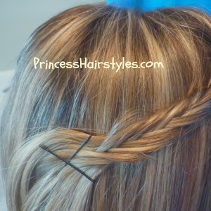 fishtail braid pin back hairstyle