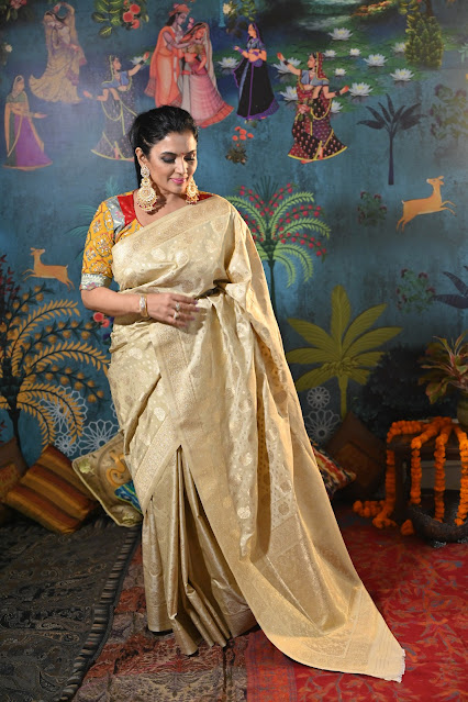 Cream and gold Banarasi silk saree