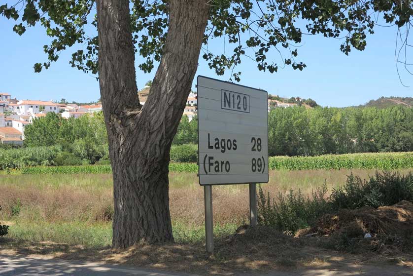 Lagos and Faro road sign in Aljezur, Algarve.