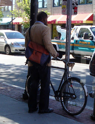 3 speed cyclist with a messenger bag